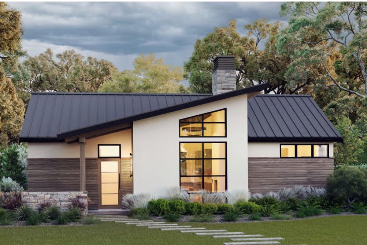 Contemporary cottage ADU with modern windows
